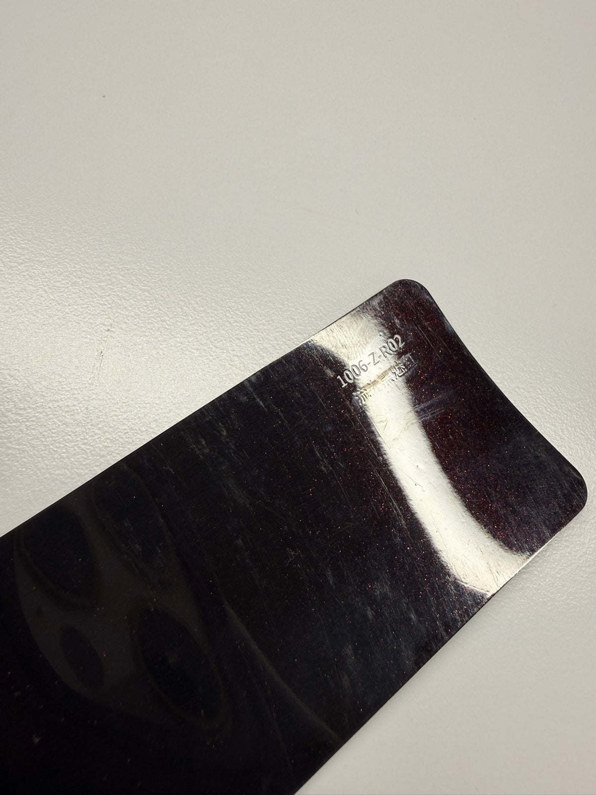 AUREON Metallic Black Cherry color PPF film swatch
