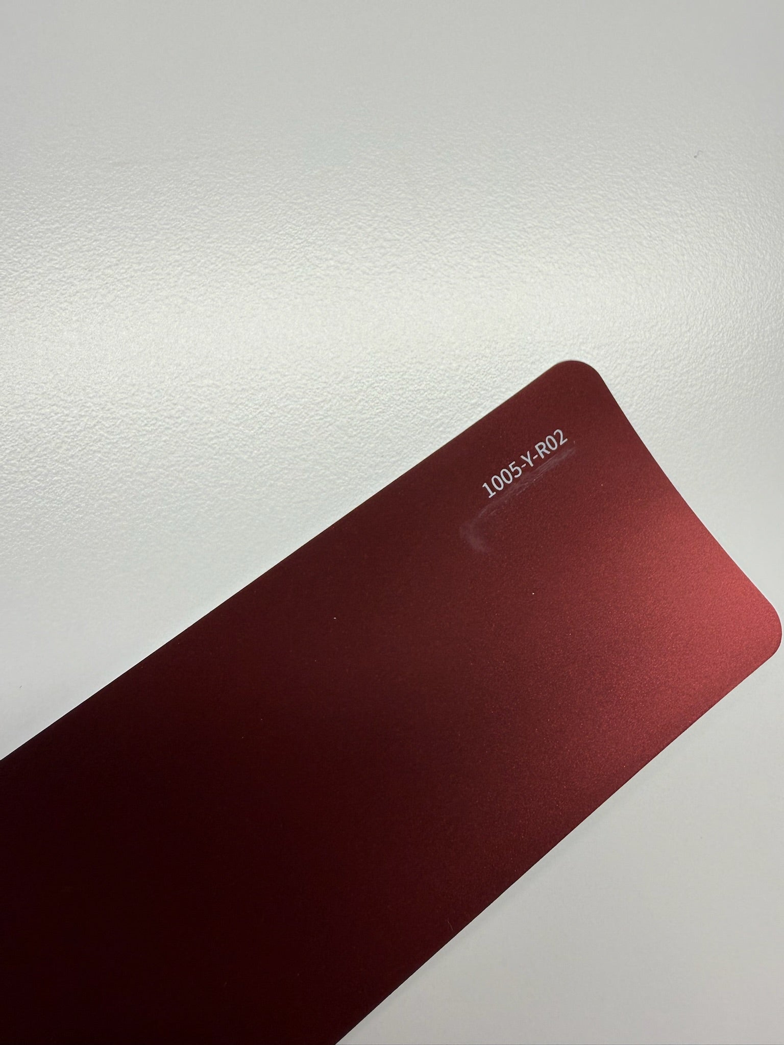 AUREON Matte Lava Red color PPF film swatch