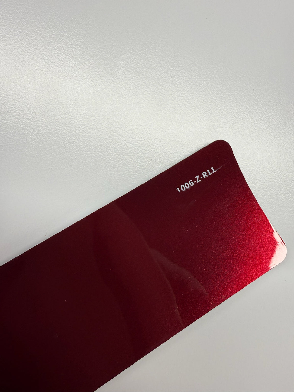 AUREON Metallic Rose Red color PPF film swatch