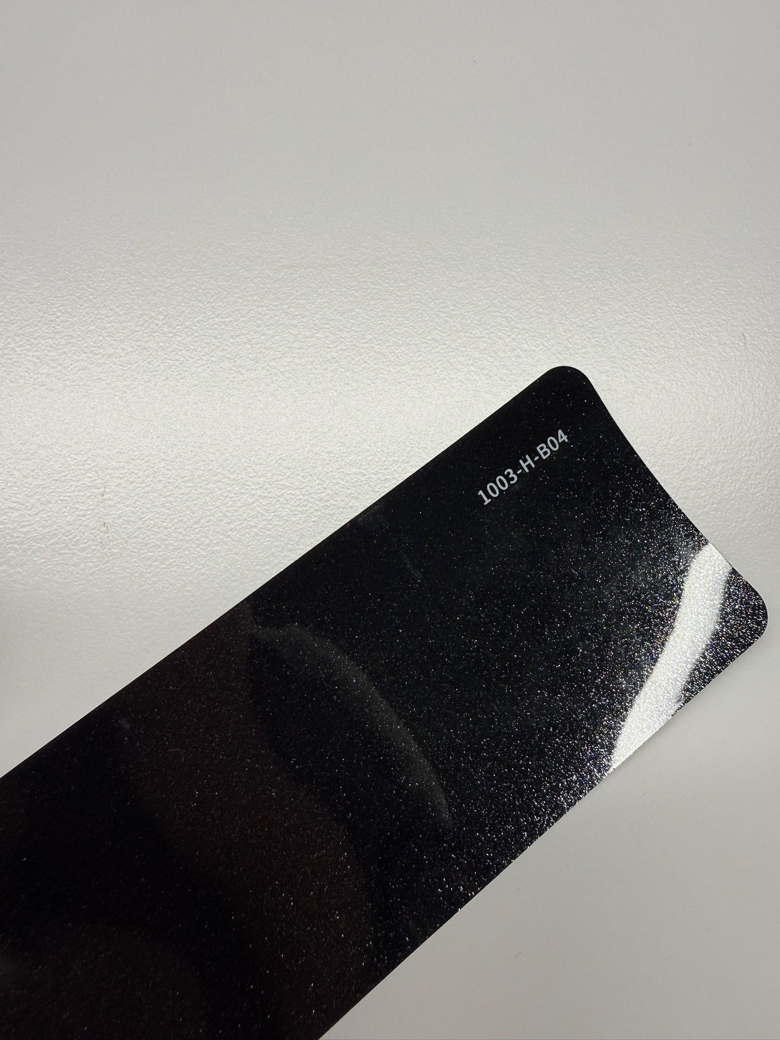 AUREON Pearl Black color PPF film swatch