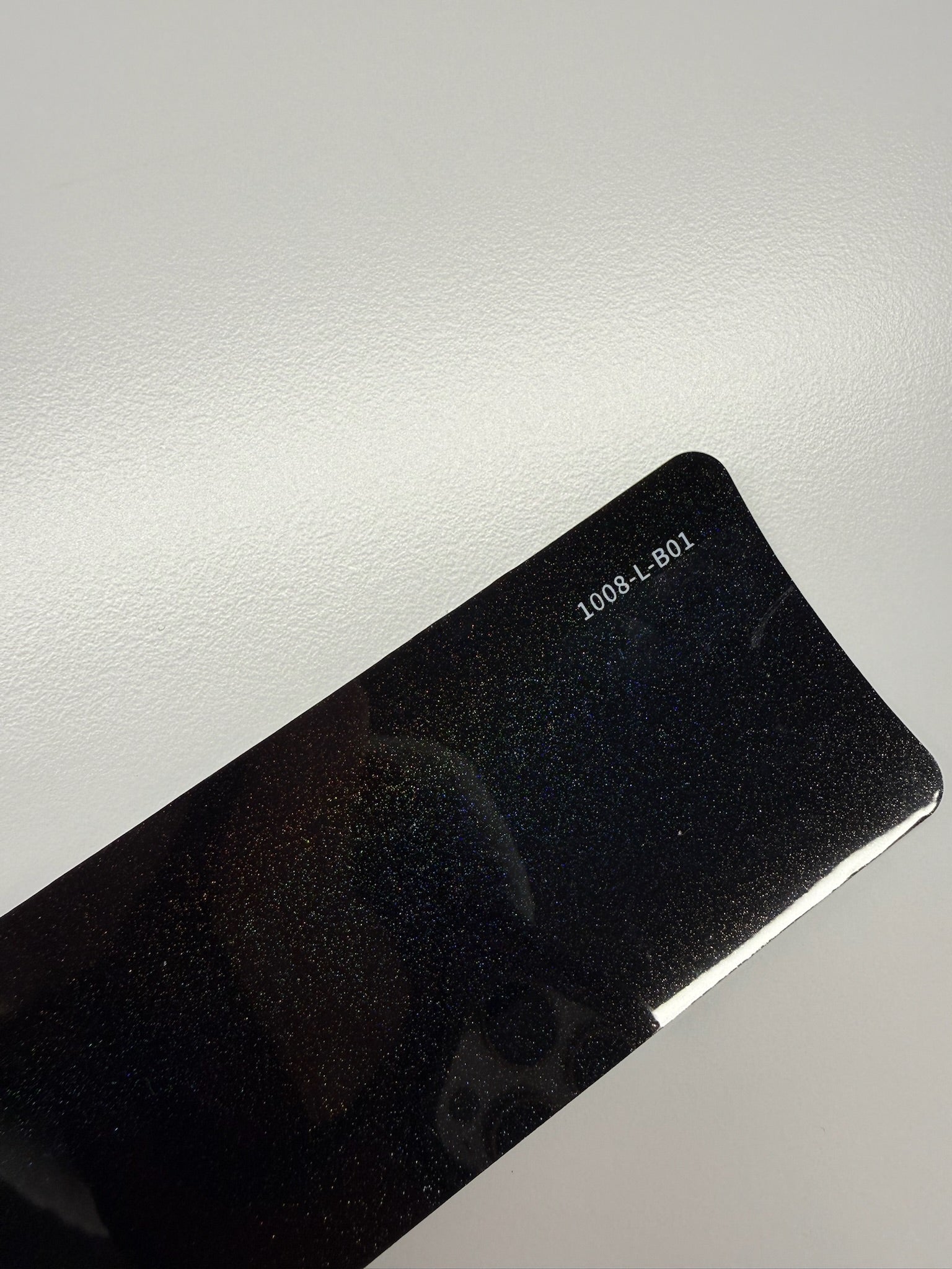 AUREON Laser Black color PPF film swatch